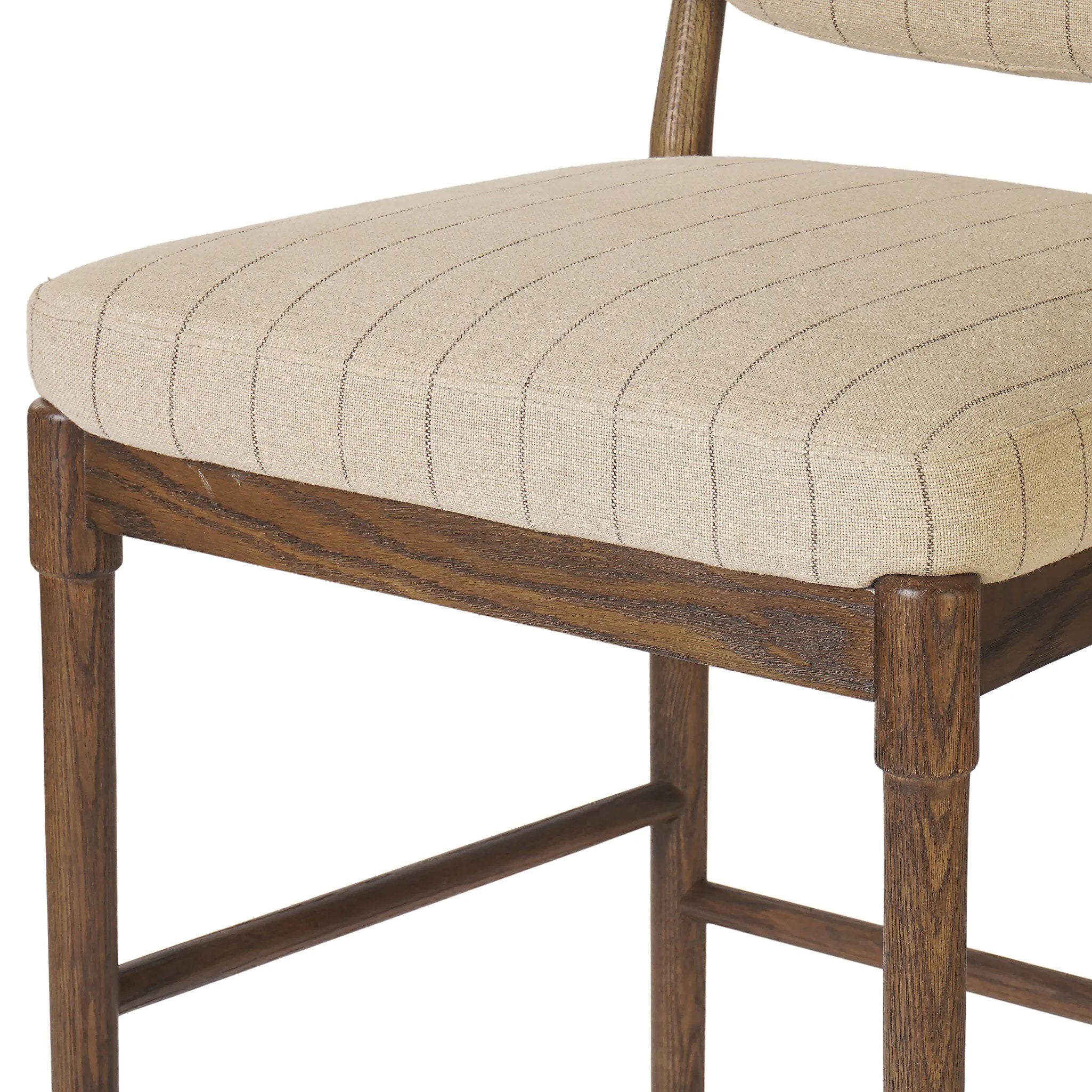Featuring Esther Lavon Flint Bar + Counter Stool by Four Hands at Amethyst Home. Modern materials place an updated twist on the traditional bar stool. Linen/cotton blend cushioning features a faint pinstripe for a unique-while-versatile look. Simply framed by brown oak and perfect in pairs or multiples. Overall Dimensions: Counter:
21.25"w x 24.25"d x 40.00"h
. Amethyst Home provides interior design, new home construction design consulting, vintage area rugs, and lighting in the Boston metro area.