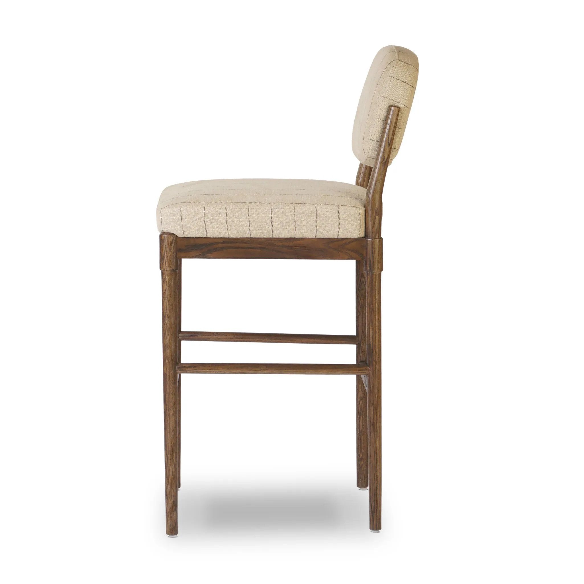 Featuring Esther Lavon Flint Bar + Counter Stool by Four Hands at Amethyst Home. Modern materials place an updated twist on the traditional bar stool. Linen/cotton blend cushioning features a faint pinstripe for a unique-while-versatile look. Simply framed by brown oak and perfect in pairs or multiples. Overall Dimensions: Counter:
21.25"w x 24.25"d x 40.00"h. Amethyst Home provides interior design, new home construction design consulting, vintage area rugs, and lighting in the Seattle metro area.