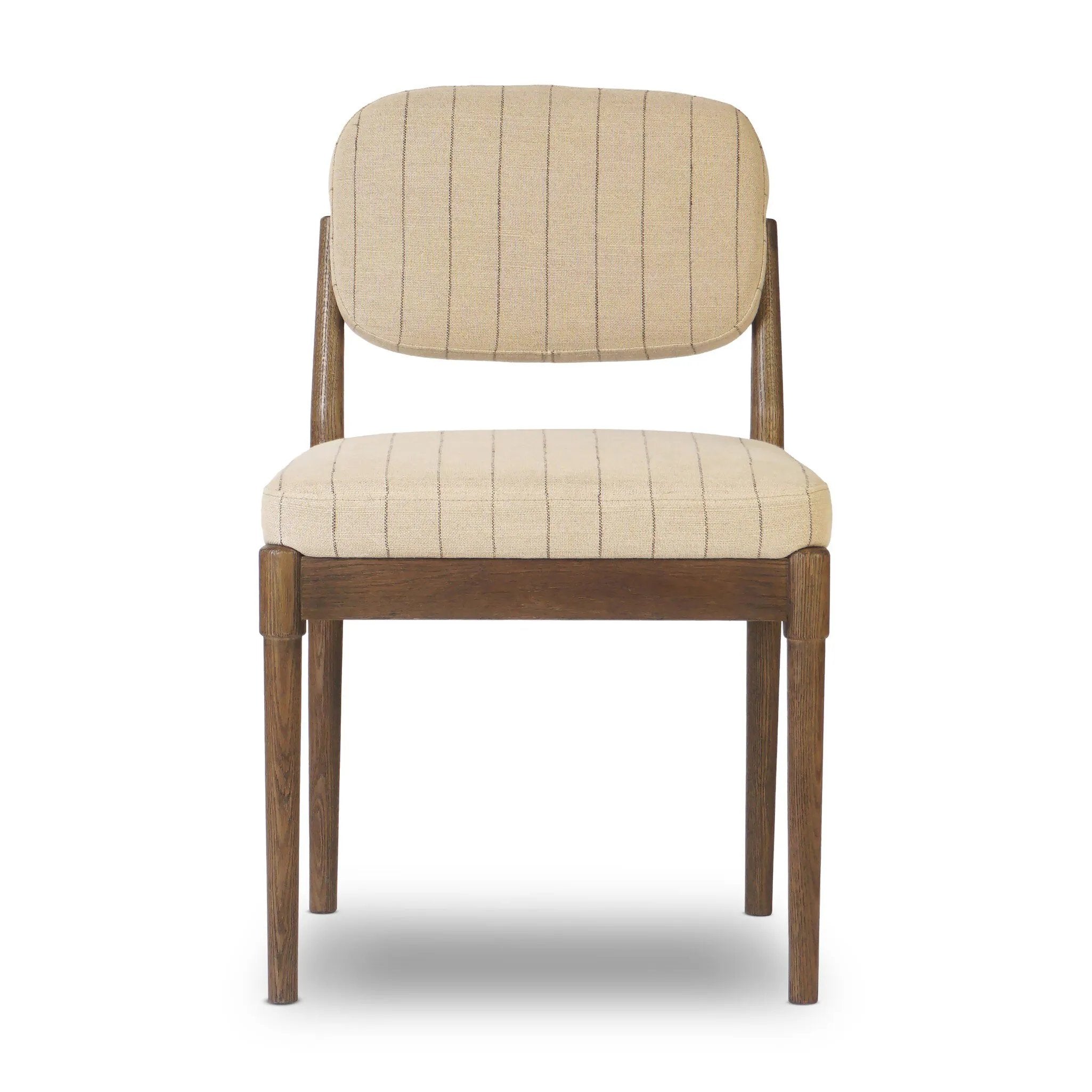 Modern materials place an updated twist on the traditional armless dining chair. Linen/cotton blend cushioning features a faint pinstripe for a unique-while-versatile look. Simply framed by brown oak Amethyst Home provides interior design, new home construction design consulting, vintage area rugs, and lighting in the Newport Beach metro area.