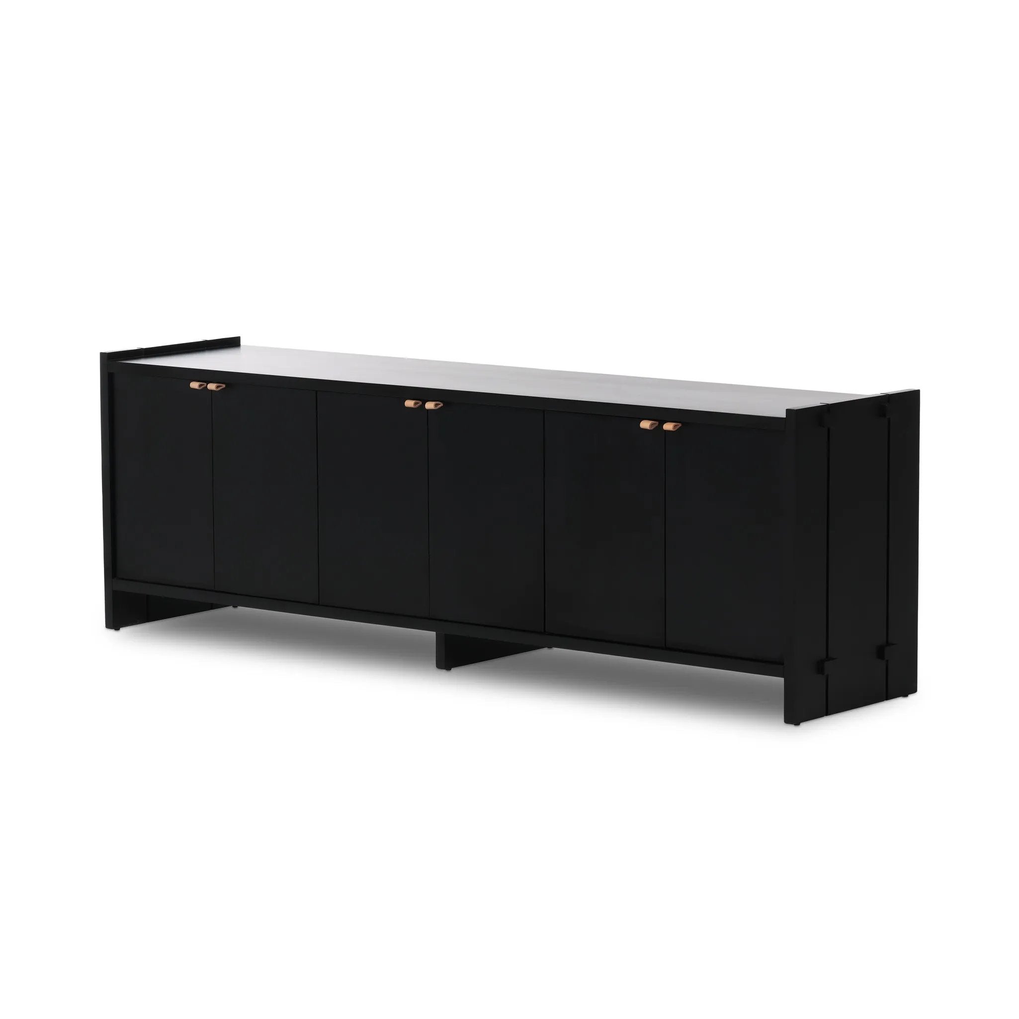 Featuring Etro Black Wash Poplar Media Console by Four Hands at Amethyst Home. Inspired by retro European design, a character-rich media console is made from black-finished poplar, with mortise and tenon joinery spanning its sides. Door pulls of top-grain leather add a textural finishing touch, while three rear cutouts keep cords out of sight.Overall Dimens. Amethyst Home provides interior design, new home construction design consulting, vintage area rugs, and lighting in the Charlotte metro area.