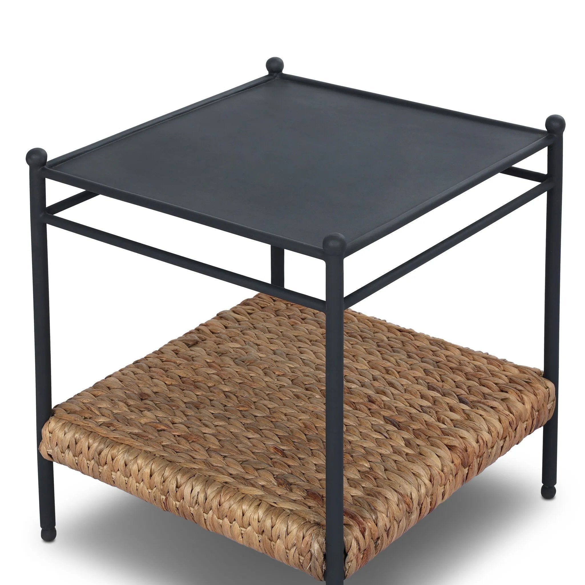 Work subtle coastal vibes into any room with this mixed-material end table, pairing woven hyacinth with charcoal-finished steel. Simplified heritage ball detailing on each leg adds a design-forward touch.As fans of organic modern aesthetics at Amethyst, we love the designer inspired Evanne End Table - Charcoal Iron. Amethyst Home provides interior design, new home construction design consulting, vintage area rugs, and lighting in the Scottsdale metro area.