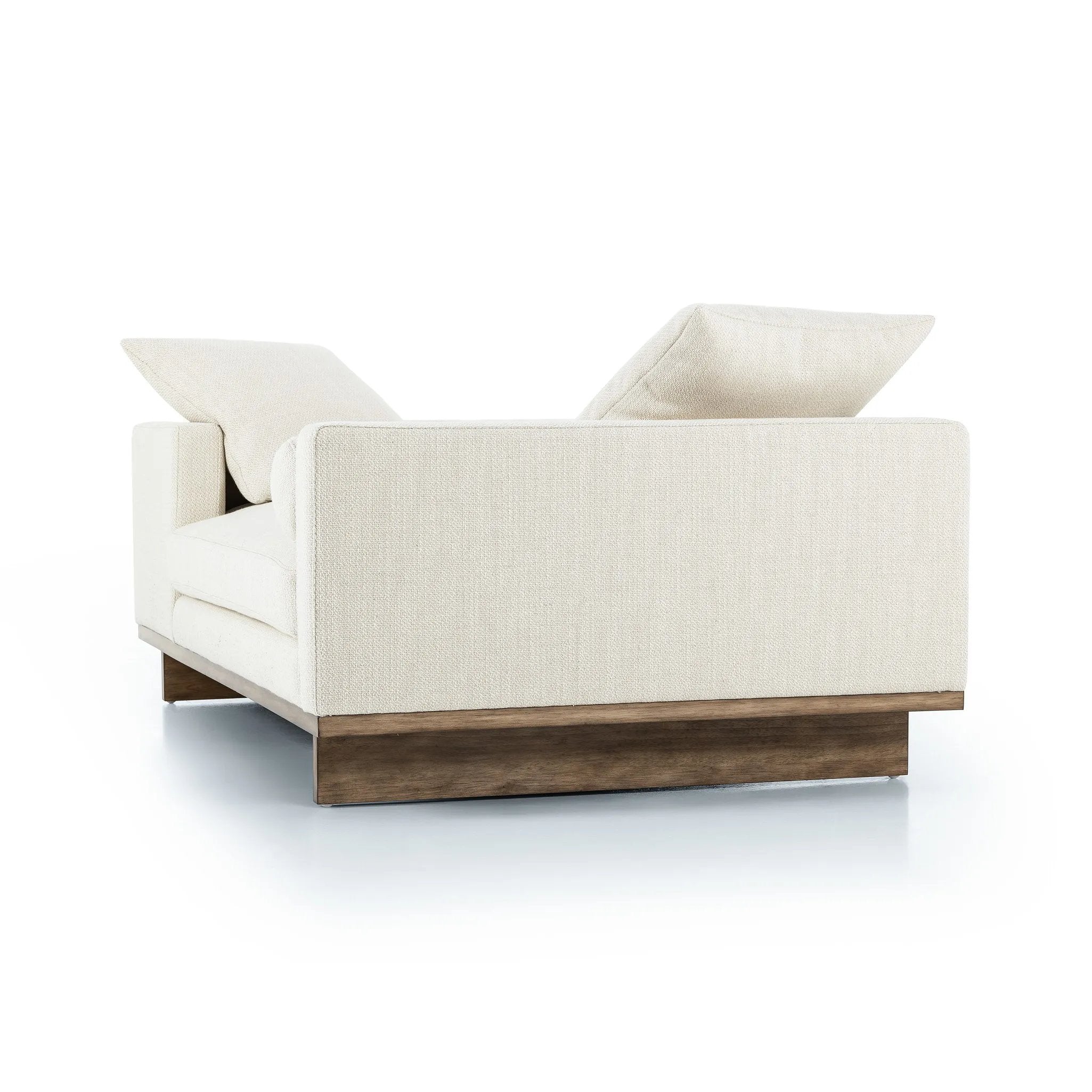Classic goes contemporary. A cocoa-finished parawood base supports low, deep seating of performance-grade upholstery in an invitingly neutral taupe. Designed with track arms on both ends for a clean touch. Amethyst Home provides interior design, new home construction design consulting, vintage area rugs, and lighting in the Nashville metro area.