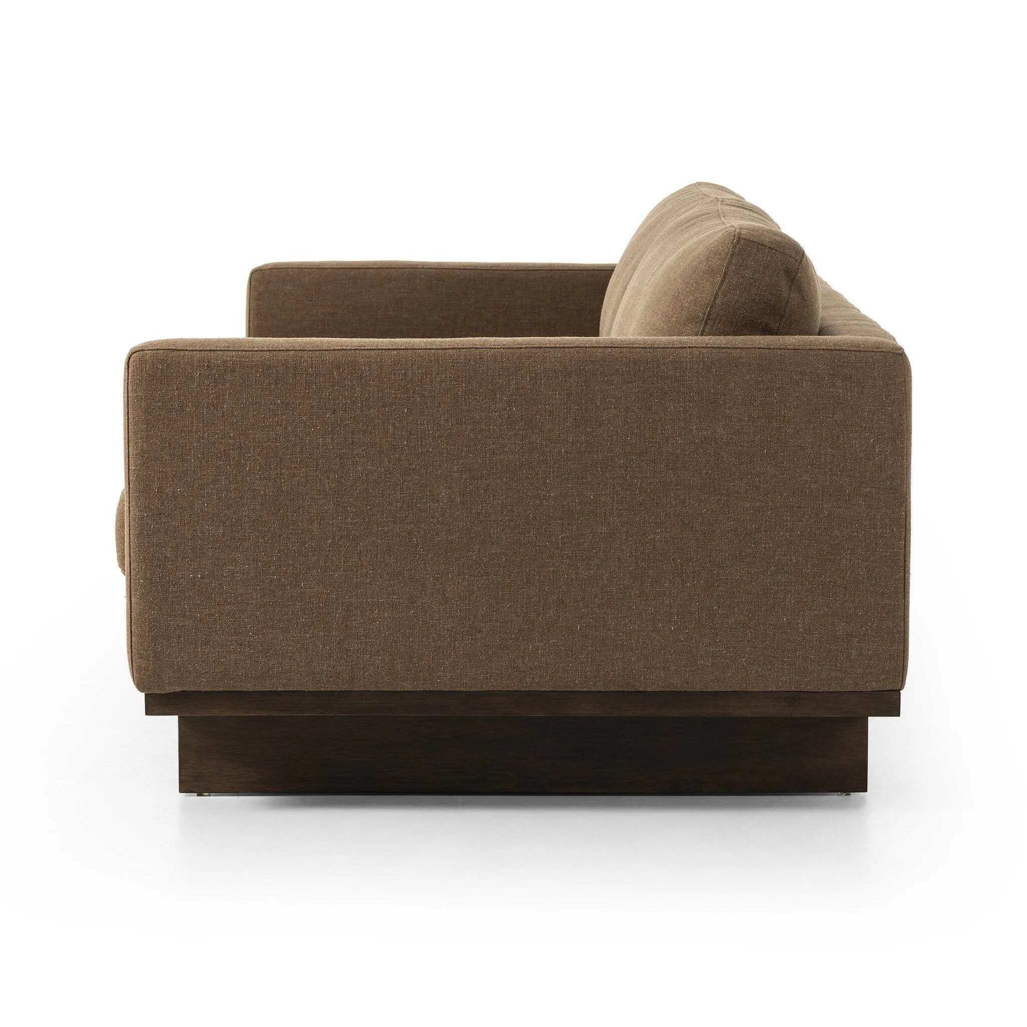 Classic goes contemporary. A brown-finished parawood base supports low, deep seating of high-performance fabric, with track arms for a clean touch.As fans of clean design at Amethyst, we love the warm modern inspired Everly Sofa - Antwerp Cafe. This item pairs well with other brands such as Four Hands and is perfect for minimalist homes Amethyst Home provides interior design, new home construction design consulting, vintage area rugs, and lighting in the Boston metro area.