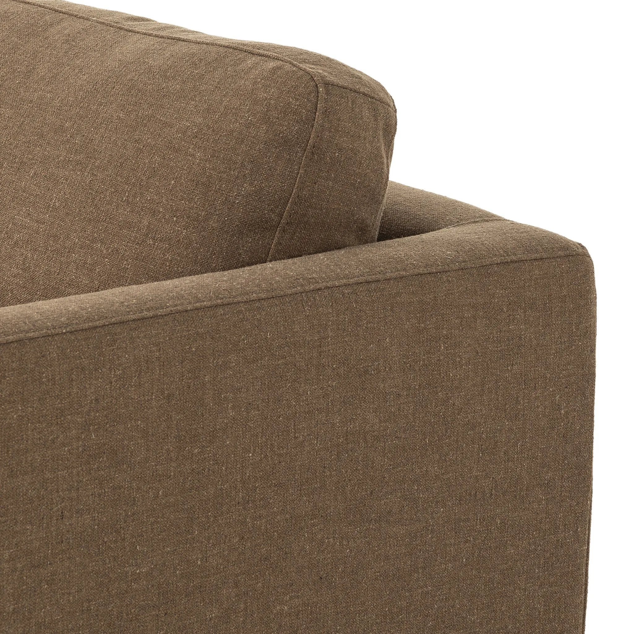 Classic goes contemporary. A brown-finished parawood base supports low, deep seating of high-performance fabric, with track arms for a clean touch.As fans of clean design at Amethyst, we love the warm modern inspired Everly Sofa - Antwerp Cafe. This item pairs well with other brands such as Four Hands and is perfect for minimalist homes Amethyst Home provides interior design, new home construction design consulting, vintage area rugs, and lighting in the Kansas City metro area.