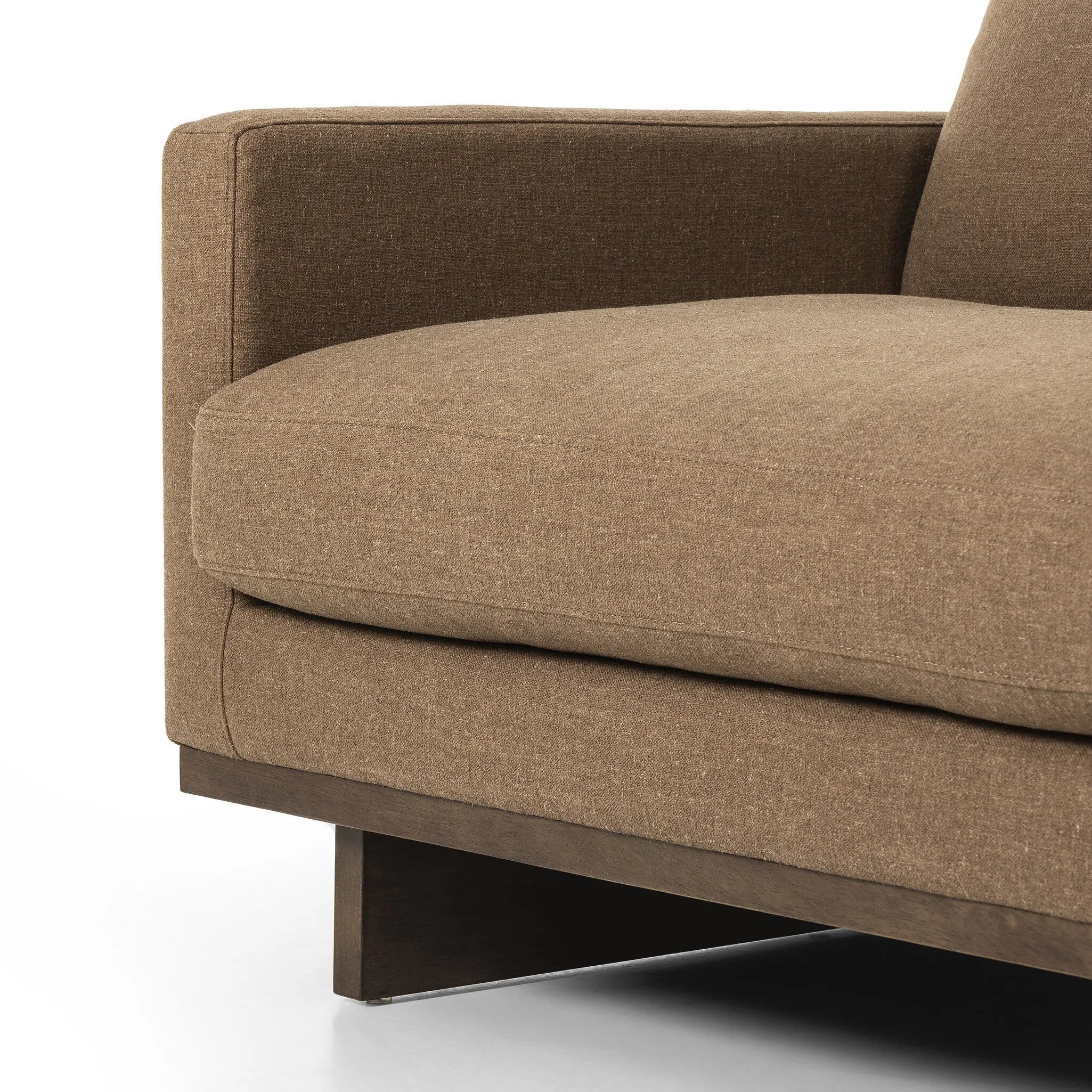 Classic goes contemporary. A brown-finished parawood base supports low, deep seating of high-performance fabric, with track arms for a clean touch.As fans of clean design at Amethyst, we love the warm modern inspired Everly Sofa - Antwerp Cafe. This item pairs well with other brands such as Four Hands and is perfect for minimalist homes Amethyst Home provides interior design, new home construction design consulting, vintage area rugs, and lighting in the Omaha metro area.