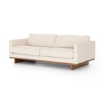 Classic goes contemporary. A brown-finished parawood base supports low, deep seating of high-performance fabric, with track arms for a clean touch.As enthusiasts of organic modern design at Amethyst, we love the nature inspired Everly Sofa - Irving Taupe. This item pairs well with other brands such as Loloi Rugs and is perfect for coastal homes Amethyst Home provides interior design, new home construction design consulting, vintage area rugs, and lighting in the Alpharetta metro area.