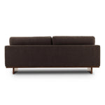 Classic goes contemporary. A brown-finished parawood base supports low, deep seating of high-performance fabric, with track arms for a clean touch.As enthusiasts of natural aesthetics at Amethyst, we love the warm modern inspired Everly Sofa - Landale Charcoal. This item pairs well with other brands such as Ethnicraft and is perfect for loft homes Amethyst Home provides interior design, new home construction design consulting, vintage area rugs, and lighting in the Monterey metro area.