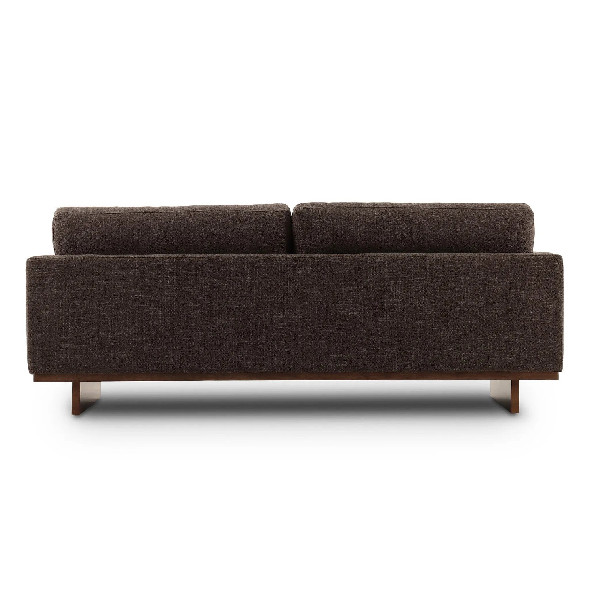 Classic goes contemporary. A brown-finished parawood base supports low, deep seating of high-performance fabric, with track arms for a clean touch.As enthusiasts of natural aesthetics at Amethyst, we love the warm modern inspired Everly Sofa - Landale Charcoal. This item pairs well with other brands such as Ethnicraft and is perfect for loft homes Amethyst Home provides interior design, new home construction design consulting, vintage area rugs, and lighting in the Monterey metro area.
