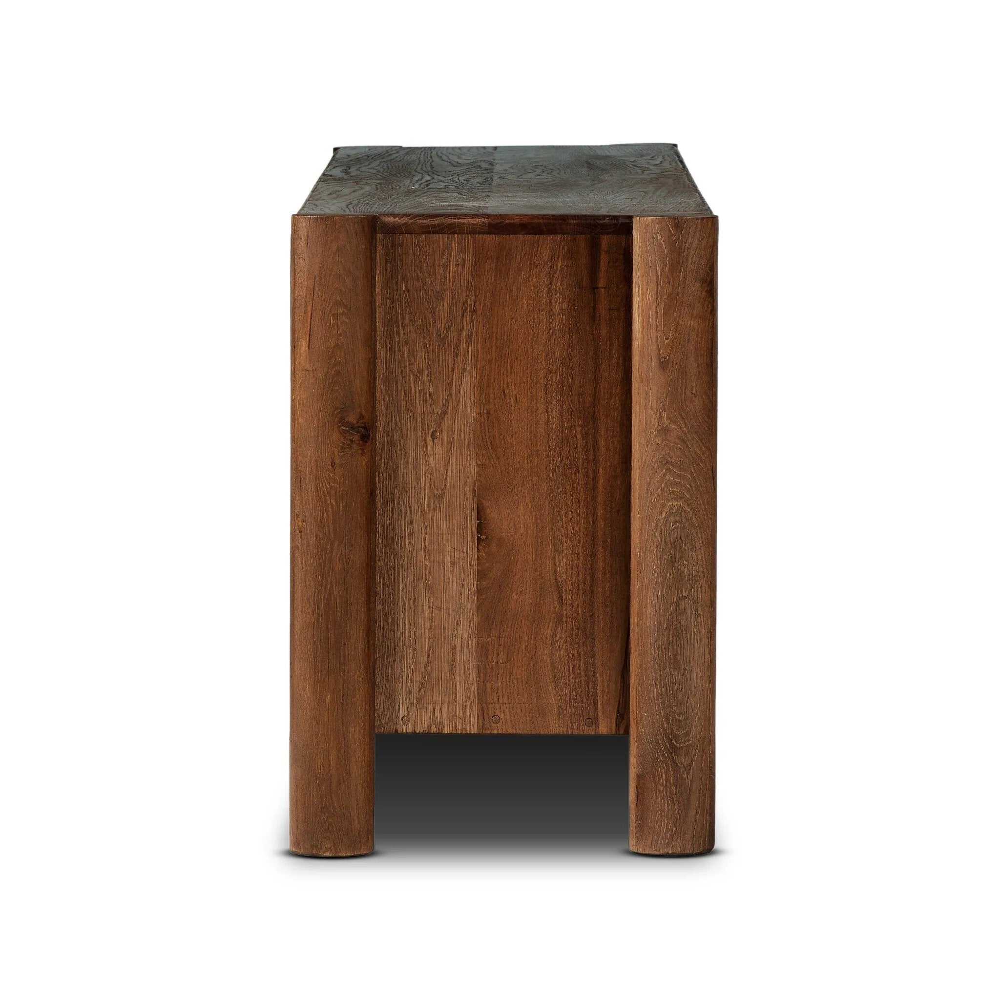Featuring Ezri Cocoa Oak Media Console by Four Hands at Amethyst Home. Grain and character variation of cocoa-finished oak craft an intriguingly organic look. The carved design and floor-to-top cylinder legs give a primitive look that balances the movement of the wood pattern.
Overall Dimensions: 18.0" L x 82.0 " W x 27.0" H
Collection: AidenColors: Cocoa O. Amethyst Home provides interior design, new home construction design consulting, vintage area rugs, and lighting in the Charlotte metro area.