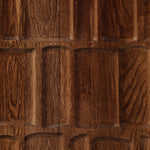 Grain and character variation of cocoa-finished oak craft an intriguingly organic look. The carved design and floor-to-top cylinder legs give a primitive look that balances the movement of the wood pattern.Collection: Aide Amethyst Home provides interior design, new home construction design consulting, vintage area rugs, and lighting in the Salt Lake City metro area.