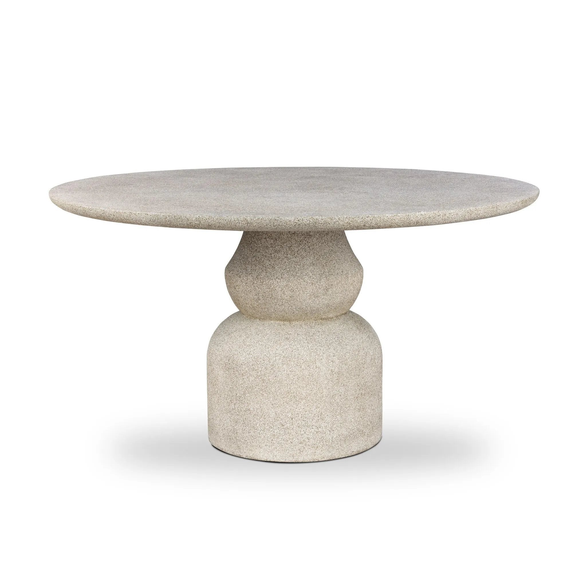 This outdoor dining table brings a fresh take to the classic pedestal silhouette. Shaped in an aged concrete that has lots of character and depth for an authentically weathered look. Cover or store inside during inclement weather and when not in use. Amethyst Home provides interior design, new home construction design consulting, vintage area rugs, and lighting in the Nashville metro area.