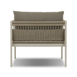 It's all in the mix with this outdoor chair, featuring a rich upholstery with a brushed texture, cord-wrapped arms and a woven back. The low-lying frame makes this the perfect seat for lounging. Cover or store inside during inclement weather and when not in use. Amethyst Home provides interior design, new home construction design consulting, vintage area rugs, and lighting in the Boston metro area.