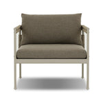 It's all in the mix with this outdoor chair, featuring a rich upholstery with a brushed texture, cord-wrapped arms and a woven back. The low-lying frame makes this the perfect seat for lounging. Cover or store inside during inclement weather and when not in use. Amethyst Home provides interior design, new home construction design consulting, vintage area rugs, and lighting in the Newport Beach metro area.