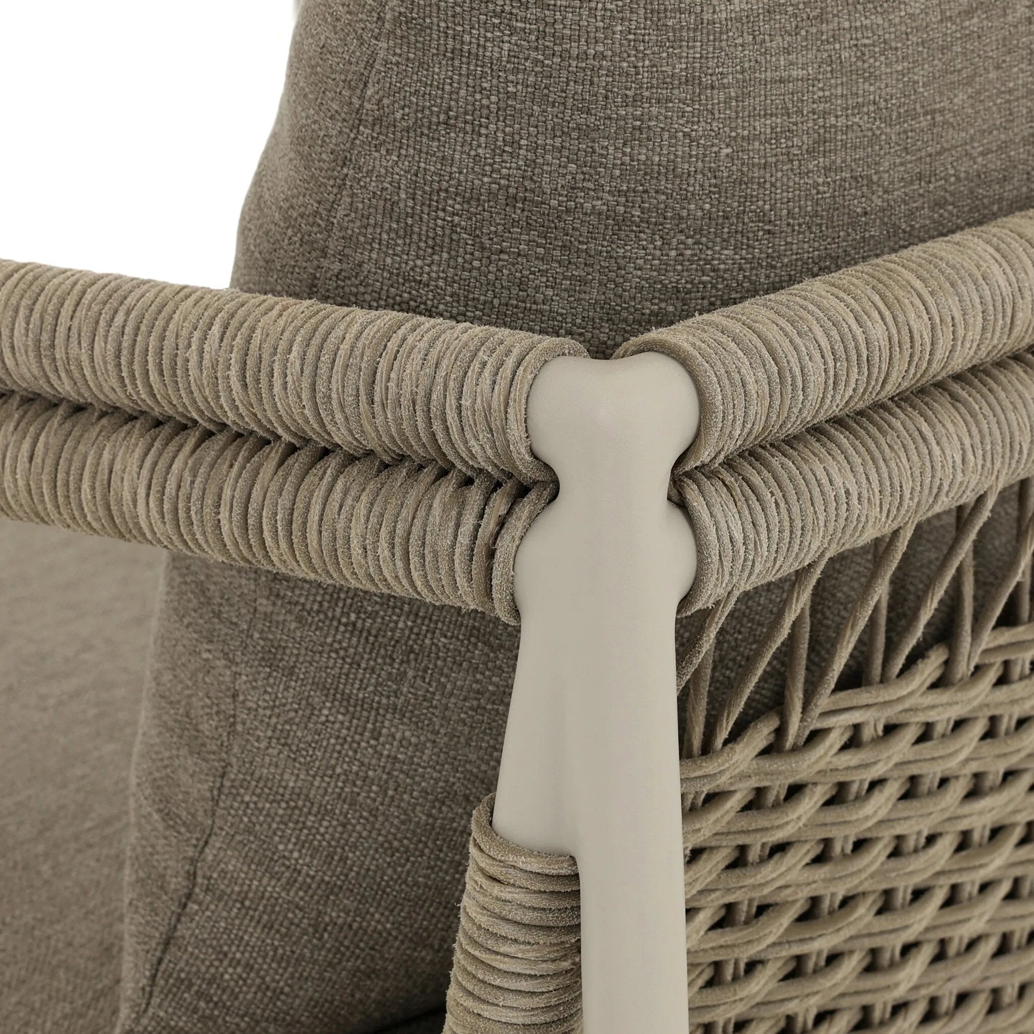 It's all in the mix with this outdoor chair, featuring a rich upholstery with a brushed texture, cord-wrapped arms and a woven back. The low-lying frame makes this the perfect seat for lounging. Cover or store inside during inclement weather and when not in use. Amethyst Home provides interior design, new home construction design consulting, vintage area rugs, and lighting in the Park City metro area.