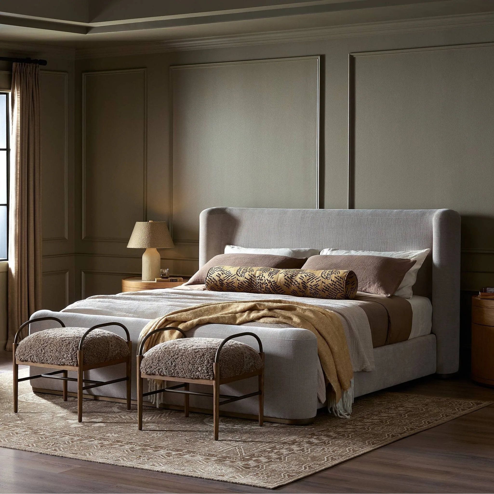 A transitional style to complement your collection, sheltered head and footboards shape a soft, contour-inspired silhouette, grounded by a plinth ash base. With clean lines and all-around cushioning, this upholstered bed brings an inviting look to the bedroom Amethyst Home provides interior design, new home construction design consulting, vintage area rugs, and lighting in the Park City metro area.
