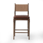 Classic meets current. Simplified turn shaping meets subtly curved legs to elevate a clean, traditional frame of walnut-finished solid ash. A brown top-grain leather cushion complements a back rest of textural paper cord. A design collaboration by Amber Lewis and Four Hands. Amethyst Home provides interior design, new home construction design consulting, vintage area rugs, and lighting in the Tampa metro area.