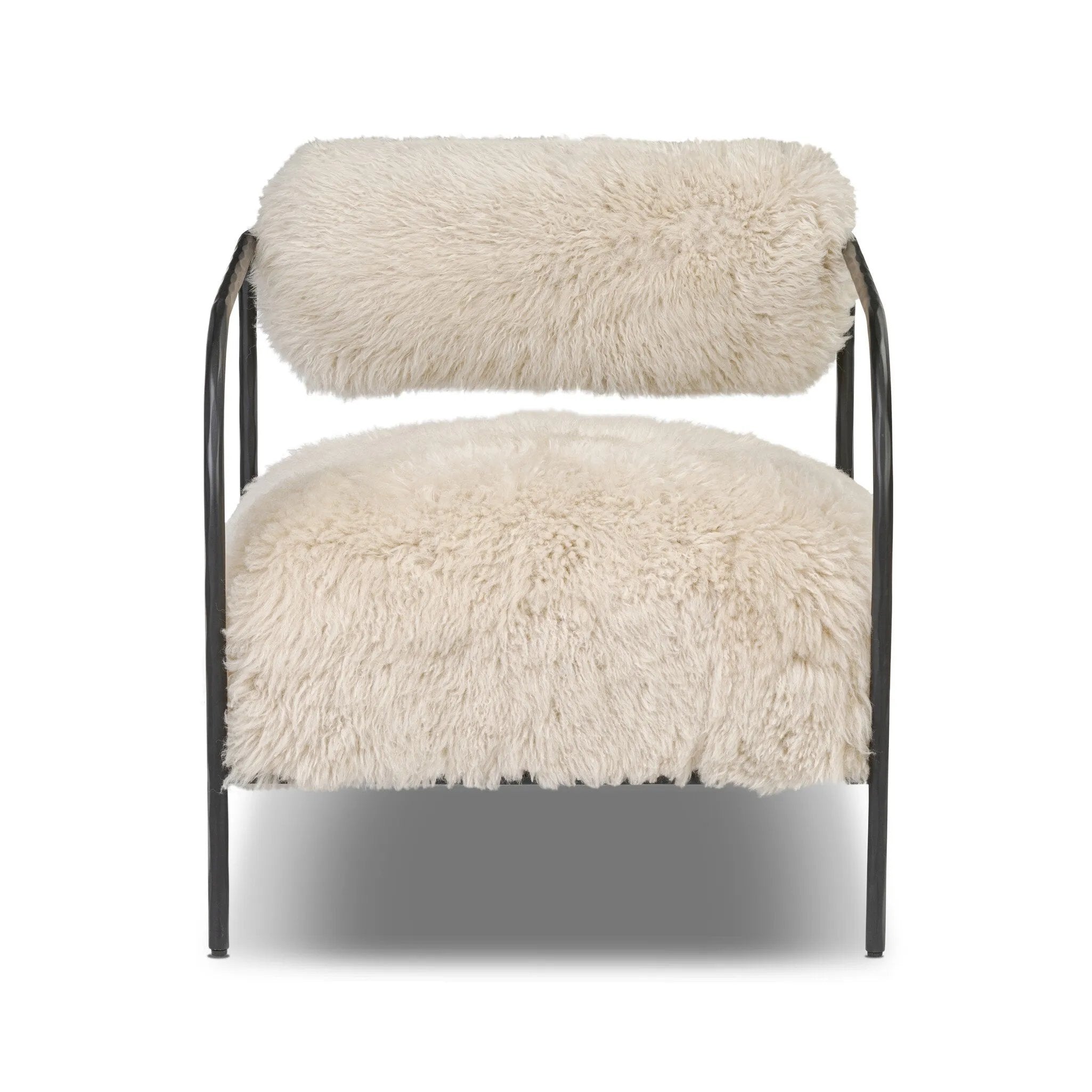 A textural take on a timeless silhouette. Hammered iron frames a squared seat and bolster back upholstered in off-white Mongolian fur Amethyst Home provides interior design, new home construction design consulting, vintage area rugs, and lighting in the Austin metro area.