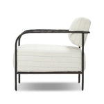 A slim take on a timeless silhouette. Hammered iron frames a squared seat and bolster back upholstered in striped, neutral fabric. Cover or store inside during inclement weather and when not in use.As enthusiasts of organic modern style at Amethyst, we love the nature inspired Fenn Outdoor Chair - Amalfi Natural. Amethyst Home provides interior design, new home construction design consulting, vintage area rugs, and lighting in the San Diego metro area.