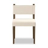 Mixed materials at their finest. Brown parawood forms a slight, simple frame for squared seating of neutral performance-grade upholstery. Charcoal top-grain leather backing takes this modern-minded dining chair to the next level Amethyst Home provides interior design, new home construction design consulting, vintage area rugs, and lighting in the Nashville metro area.
