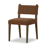Mixed materials at their finest. Brown parawood forms a slight, simple frame for squared seating of neutral performance-grade upholstery. Charcoal top-grain leather backing takes this modern-minded dining chair to the next level Amethyst Home provides interior design, new home construction design consulting, vintage area rugs, and lighting in the Seattle metro area.