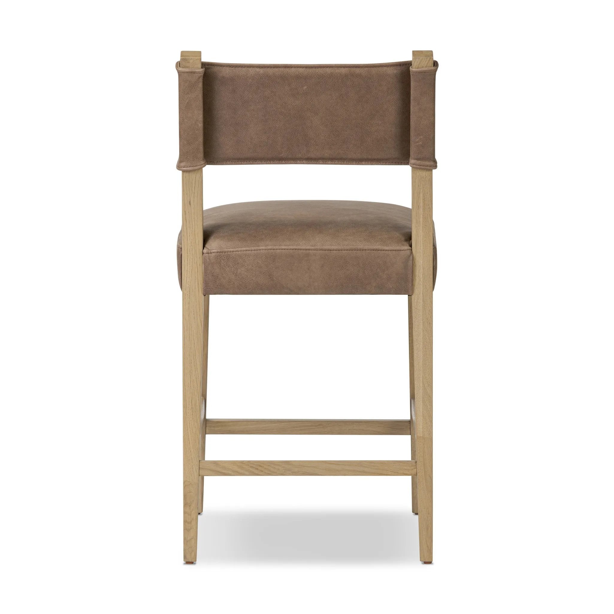 Featuring Ferris Palermo Cigar Bar + Counter Stool by Four Hands at Amethyst Home. Perfectly sized for the counter, black-finished parawood frames squared seating of high-performance fabric, with black top-grain leather backing. Performance fabrics are specially created to withstand spills, stains, high traffic and wear, ensuring long-term comfort and un. Amethyst Home provides interior design, new home construction design consulting, vintage area rugs, and lighting in the Laguna Beach metro area.