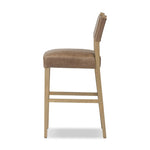 Featuring Ferris Palermo Cigar Bar + Counter Stool by Four Hands at Amethyst Home. Perfectly sized for the counter, black-finished parawood frames squared seating of high-performance fabric, with black top-grain leather backing. Performance fabrics are specially created to withstand spills, stains, high traffic and wear, ensuring long-term comfort and unmatched. Amethyst Home provides interior design, new home construction design consulting, vintage area rugs, and lighting in the Miami metro area.