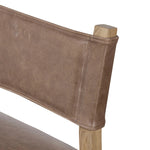 Featuring Ferris Palermo Cigar Dining Chair by Four Hands at Amethyst Home. Mixed materials at their finest. Brown parawood forms a slight, simple frame for squared seating of neutral performance-grade upholstery. Charcoal top-grain leather backing takes this modern-minded dining chair to the next level.Overall Dimensions: 20.00"w x 22.00"d x 32.00"hWeight . Amethyst Home provides interior design, new home construction design consulting, vintage area rugs, and lighting in the Park City metro area.