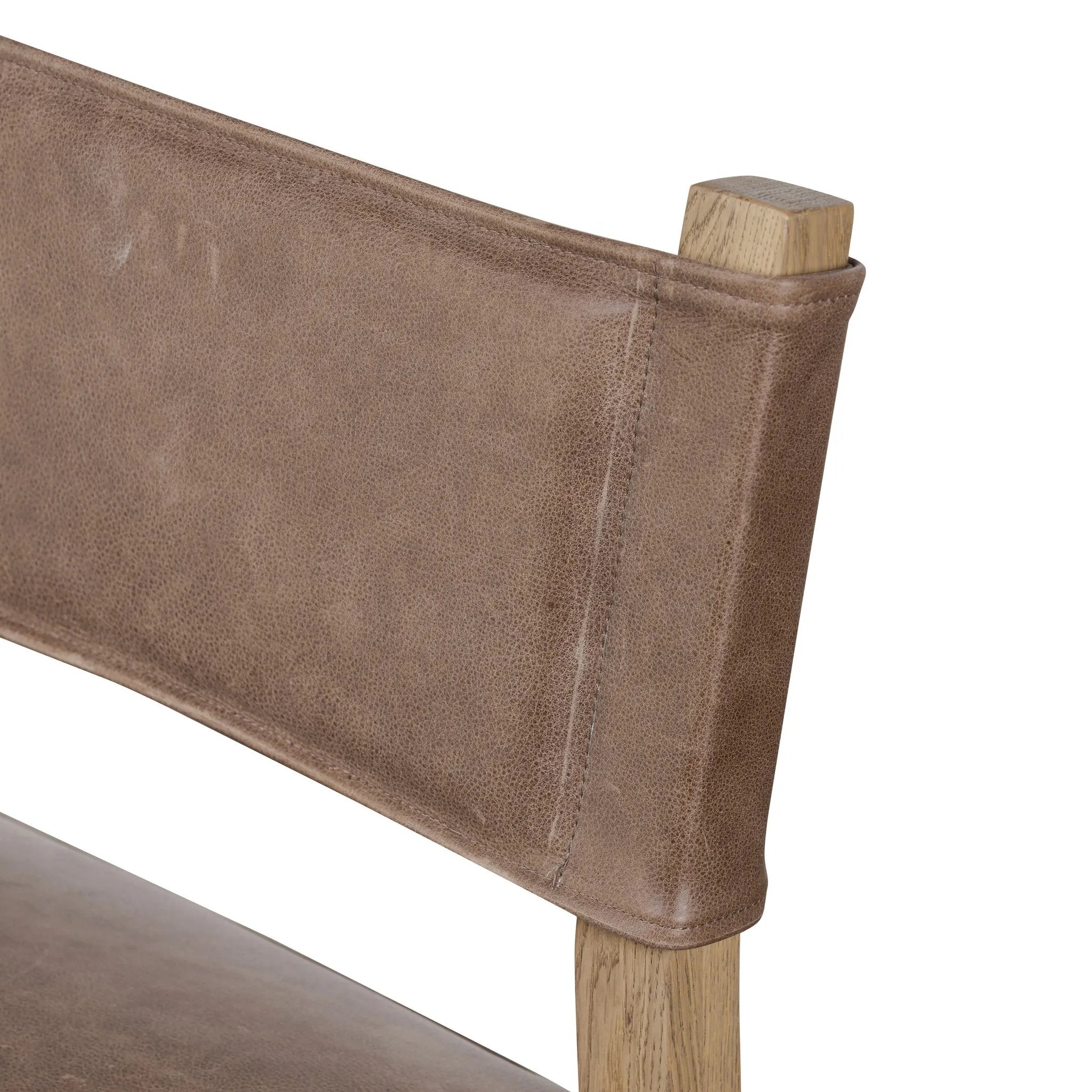 Featuring Ferris Palermo Cigar Dining Chair by Four Hands at Amethyst Home. Mixed materials at their finest. Brown parawood forms a slight, simple frame for squared seating of neutral performance-grade upholstery. Charcoal top-grain leather backing takes this modern-minded dining chair to the next level.Overall Dimensions: 20.00"w x 22.00"d x 32.00"hWeight . Amethyst Home provides interior design, new home construction design consulting, vintage area rugs, and lighting in the Park City metro area.