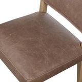 Featuring Ferris Palermo Cigar Dining Chair by Four Hands at Amethyst Home. Mixed materials at their finest. Brown parawood forms a slight, simple frame for squared seating of neutral performance-grade upholstery. Charcoal top-grain leather backing takes this modern-minded dining chair to the next level.Overall Dimensions: 20.00"w x 22.00"d x 32.00"hWeight :. Amethyst Home provides interior design, new home construction design consulting, vintage area rugs, and lighting in the Portland metro area.