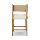 Featuring Ferris Thames Cream Bar + Counter Stool by Four Hands at Amethyst Home. Perfectly sized for the counter, burnished parawood frames squared seating of high-performance fabric, with beige top-grain leather backing. Performance fabrics are specially created to withstand spills, stains, high traffic and wear, ensuring long-term comfort and unmatched dur. Amethyst Home provides interior design, new home construction design consulting, vintage area rugs, and lighting in the Houston metro area.