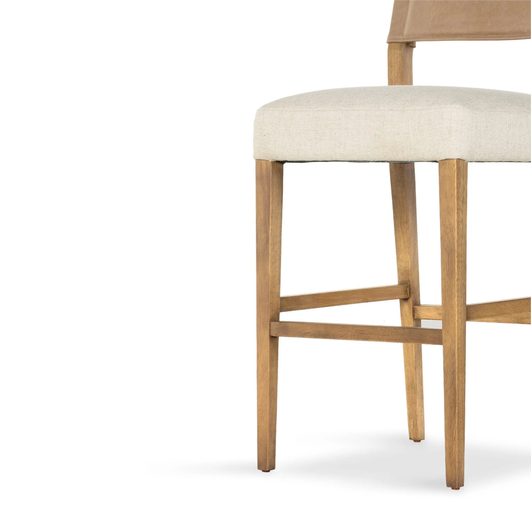 Featuring Ferris Thames Cream Bar + Counter Stool by Four Hands at Amethyst Home. Perfectly sized for the counter, burnished parawood frames squared seating of high-performance fabric, with beige top-grain leather backing. Performance fabrics are specially created to withstand spills, stains, high traffic and wear, ensuring long-term comfort and unmatched. Amethyst Home provides interior design, new home construction design consulting, vintage area rugs, and lighting in the Los Angeles metro area.