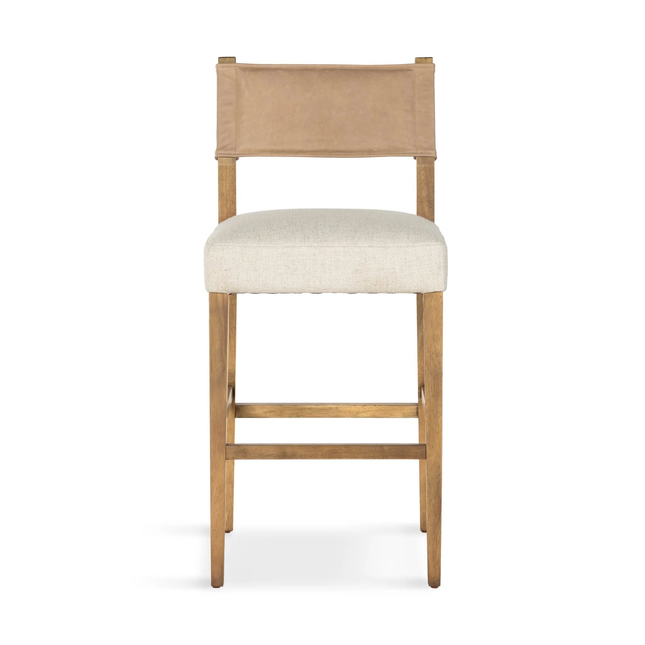 Featuring Ferris Thames Cream Bar + Counter Stool by Four Hands at Amethyst Home. Perfectly sized for the counter, burnished parawood frames squared seating of high-performance fabric, with beige top-grain leather backing. Performance fabrics are specially created to withstand spills, stains, high traffic and wear, ensuring long-term comfort and unmatched du. Amethyst Home provides interior design, new home construction design consulting, vintage area rugs, and lighting in the Monterey metro area.