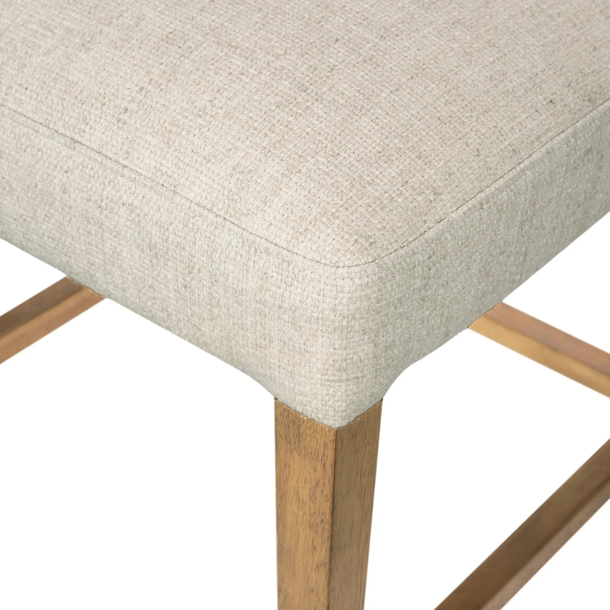 Featuring Ferris Thames Cream Bar + Counter Stool by Four Hands at Amethyst Home. Perfectly sized for the counter, burnished parawood frames squared seating of high-performance fabric, with beige top-grain leather backing. Performance fabrics are specially created to withstand spills, stains, high traffic and wear, ensuring long-term comfort and unmatch. Amethyst Home provides interior design, new home construction design consulting, vintage area rugs, and lighting in the Newport Beach metro area.