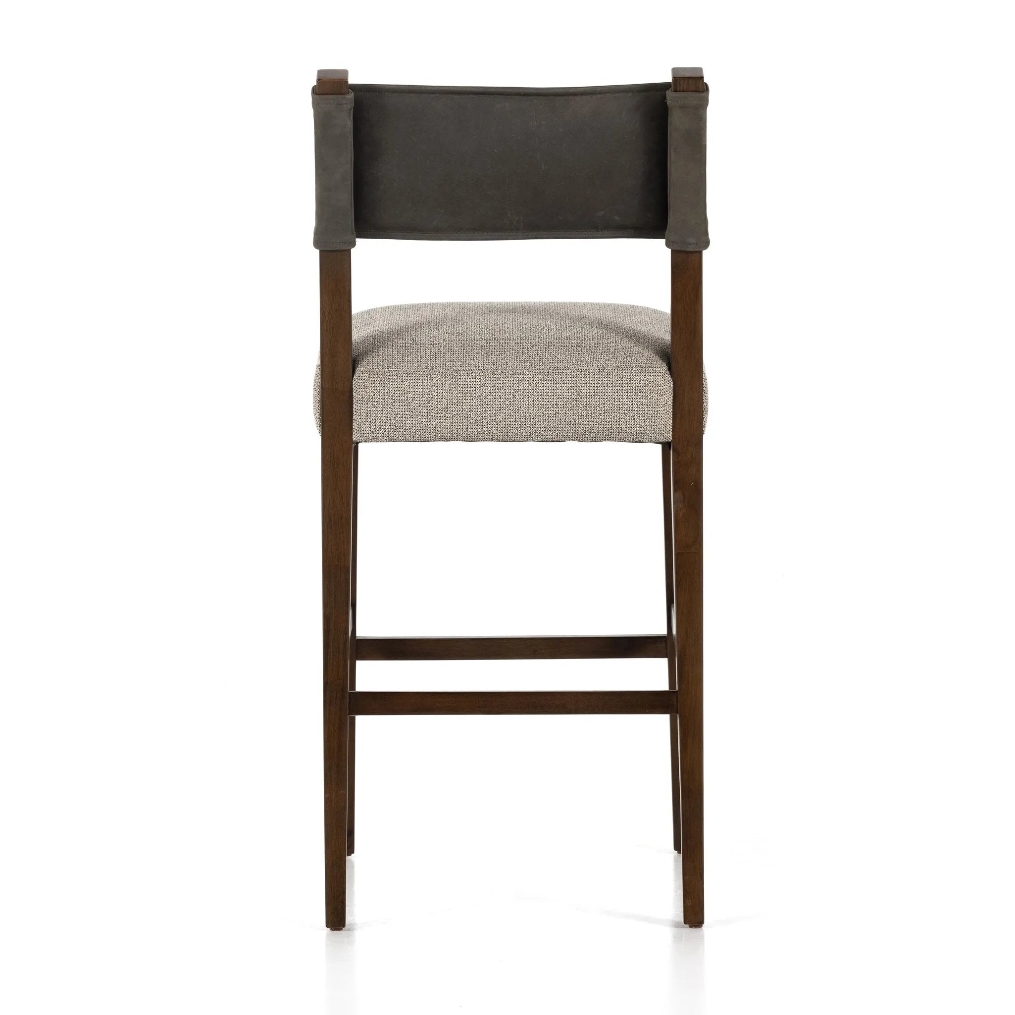 Featuring Ferris Tulsa Ink Bar + Counter Stool by Four Hands at Amethyst Home. Perfectly sized for the counter, dark-finished parawood frames squared seating of high-performance fabric, with top-grain leather backing. Performance fabrics are specially created to withstand spills, stains, high traffic and wear, ensuring long-term comfort and unmatched durabili. Amethyst Home provides interior design, new home construction design consulting, vintage area rugs, and lighting in the Seattle metro area.