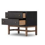 Featuring Fiona Black Raffia Nightstand by Four Hands at Amethyst Home. Woven black raffia offers a texture-driven take on bedside storage. Antique brass-finished iron hardware adorns dual drawers supported by a solid mahogany base.Overall Dimensions: 30.00"w x 17.00"d x 26.50"hWeight : 59.74 lbsMaterials: Sugar Palm, Solid Mahogany, Iron. Amethyst Home provides interior design, new home construction design consulting, vintage area rugs, and lighting in the Austin metro area.