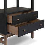 Woven black raffia drawers offer closed storage and a texture-driven take on book shelving. Antique brass-finished hardware adds a touch of vintage detailing, all framed within solid mahogany Amethyst Home provides interior design, new home construction design consulting, vintage area rugs, and lighting in the Charlotte metro area.