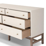 Featuring Fiona Ivory Painted Raffia 6 Drawer Dresser by Four Hands at Amethyst Home. Indulge in luxury with the Fiona Ivory Painted Raffia 6 Drawer Dresser. This elegant dresser boasts a sophisticated ivory painted finish and hand-woven raffia drawers. With six spacious drawers, it offers ample storage space while adding a touch of exclusivity to any bedroom.
. Amethyst Home provides interior design, new home construction design consulting, vintage area rugs, and lighting in the Miami metro area.