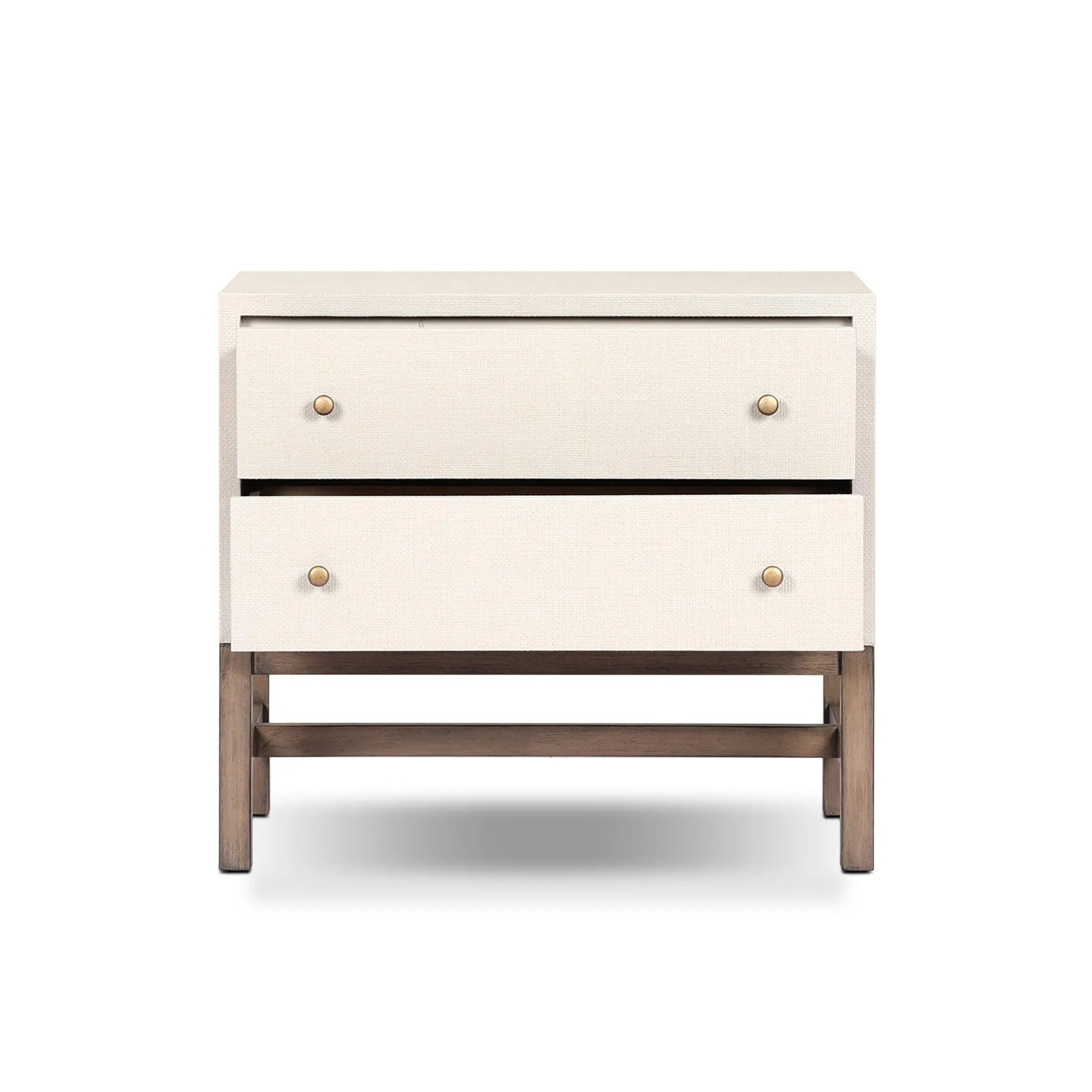 Featuring Fiona Ivory Painted Raffia Nightstand by Four Hands at Amethyst Home. Transform your bedroom into a luxurious oasis with the Fiona Ivory Painted Raffia Nightstand. Crafted with premium materials, this sophisticated nightstand exudes elegance and exclusivity. Its ivory painted raffia finish adds a touch of texture, making it a stunning addition. Amethyst Home provides interior design, new home construction design consulting, vintage area rugs, and lighting in the Winter Garden metro area.