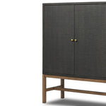 Featuring Fiona Russet Mahogany Bar Cabinet by Four Hands at Amethyst Home. Woven black raffia places a texture-driven twist on cabinetry. Simple hardware finished in an antique brass, all supported by an open, airy base of solid mahogany.Overall Dimensions: 40.00"w x 18.00"d x 52.00"hWeight : 157.63 lbsMaterials: Solid Mahogany, Iron, Sugar Palm. Amethyst Home provides interior design, new home construction design consulting, vintage area rugs, and lighting in the Des Moines metro area.