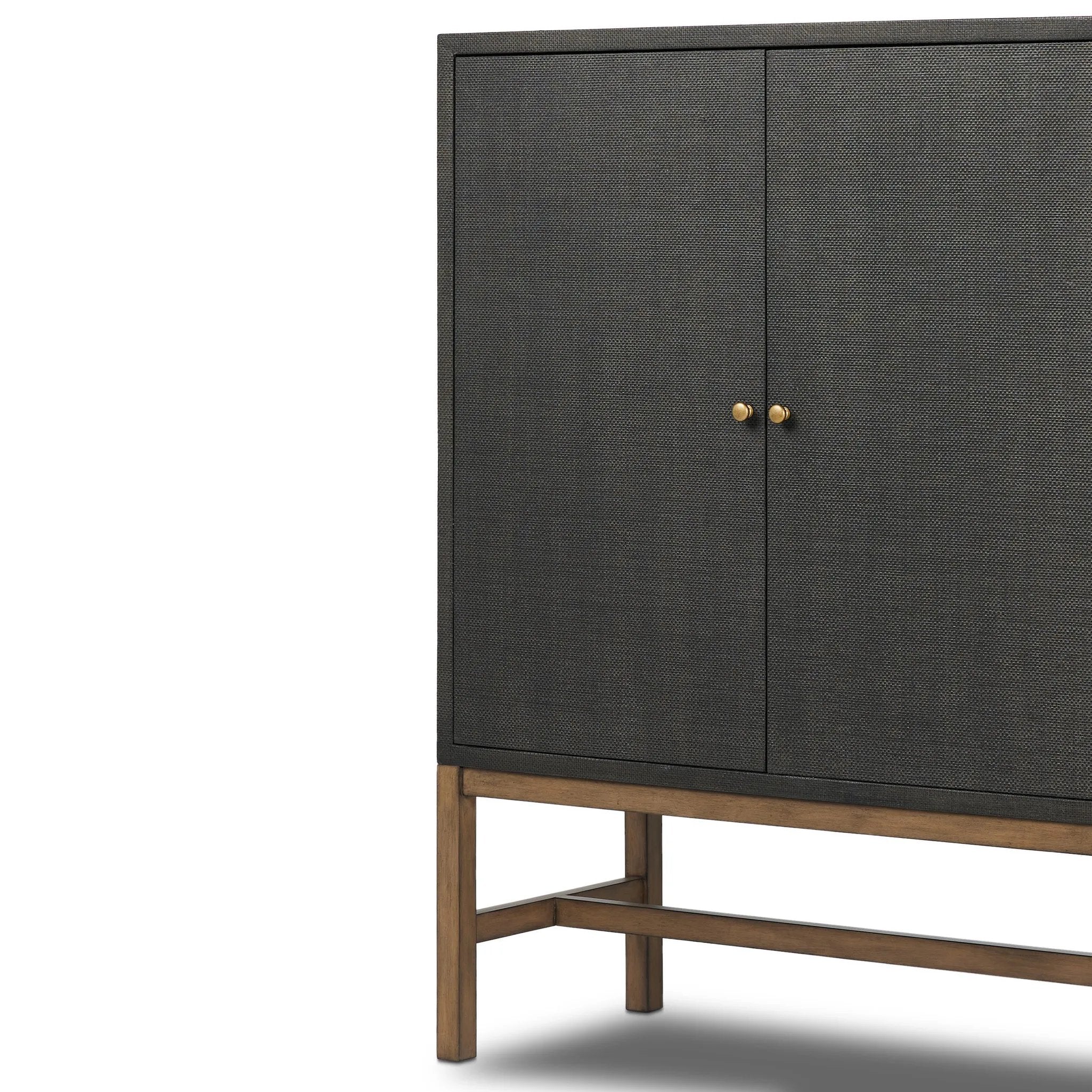 Featuring Fiona Russet Mahogany Bar Cabinet by Four Hands at Amethyst Home. Woven black raffia places a texture-driven twist on cabinetry. Simple hardware finished in an antique brass, all supported by an open, airy base of solid mahogany.Overall Dimensions: 40.00"w x 18.00"d x 52.00"hWeight : 157.63 lbsMaterials: Solid Mahogany, Iron, Sugar Palm. Amethyst Home provides interior design, new home construction design consulting, vintage area rugs, and lighting in the Des Moines metro area.