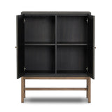 Featuring Fiona Russet Mahogany Bar Cabinet by Four Hands at Amethyst Home. Woven black raffia places a texture-driven twist on cabinetry. Simple hardware finished in an antique brass, all supported by an open, airy base of solid mahogany.Overall Dimensions: 40.00"w x 18.00"d x 52.00"hWeight : 157.63 lbsMaterials: Solid Mahogany, Iron, Sugar Palm. Amethyst Home provides interior design, new home construction design consulting, vintage area rugs, and lighting in the Newport Beach metro area.