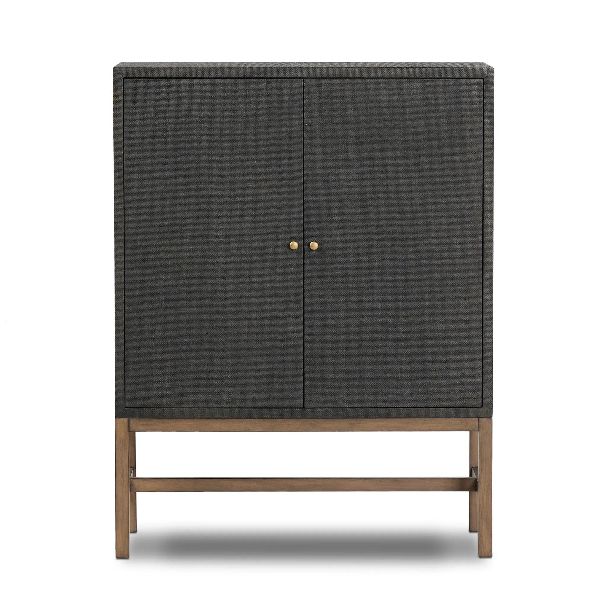 Featuring Fiona Russet Mahogany Bar Cabinet by Four Hands at Amethyst Home. Woven black raffia places a texture-driven twist on cabinetry. Simple hardware finished in an antique brass, all supported by an open, airy base of solid mahogany.Overall Dimensions: 40.00"w x 18.00"d x 52.00"hWeight : 157.63 lbsMaterials: Solid Mahogany, Iron, Sugar Palm. Amethyst Home provides interior design, new home construction design consulting, vintage area rugs, and lighting in the Park City metro area.