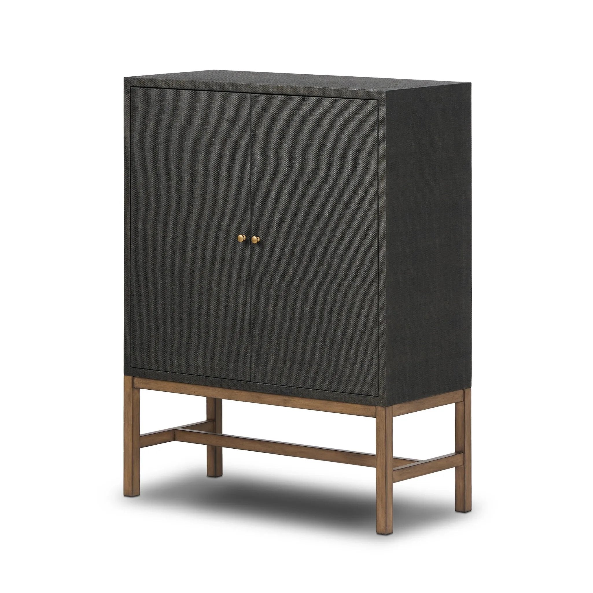 Featuring Fiona Russet Mahogany Bar Cabinet by Four Hands at Amethyst Home. Woven black raffia places a texture-driven twist on cabinetry. Simple hardware finished in an antique brass, all supported by an open, airy base of solid mahogany.Overall Dimensions: 40.00"w x 18.00"d x 52.00"hWeight : 157.63 lbsMaterials: Solid Mahogany, Iron, Sugar Palm. Amethyst Home provides interior design, new home construction design consulting, vintage area rugs, and lighting in the Portland metro area.