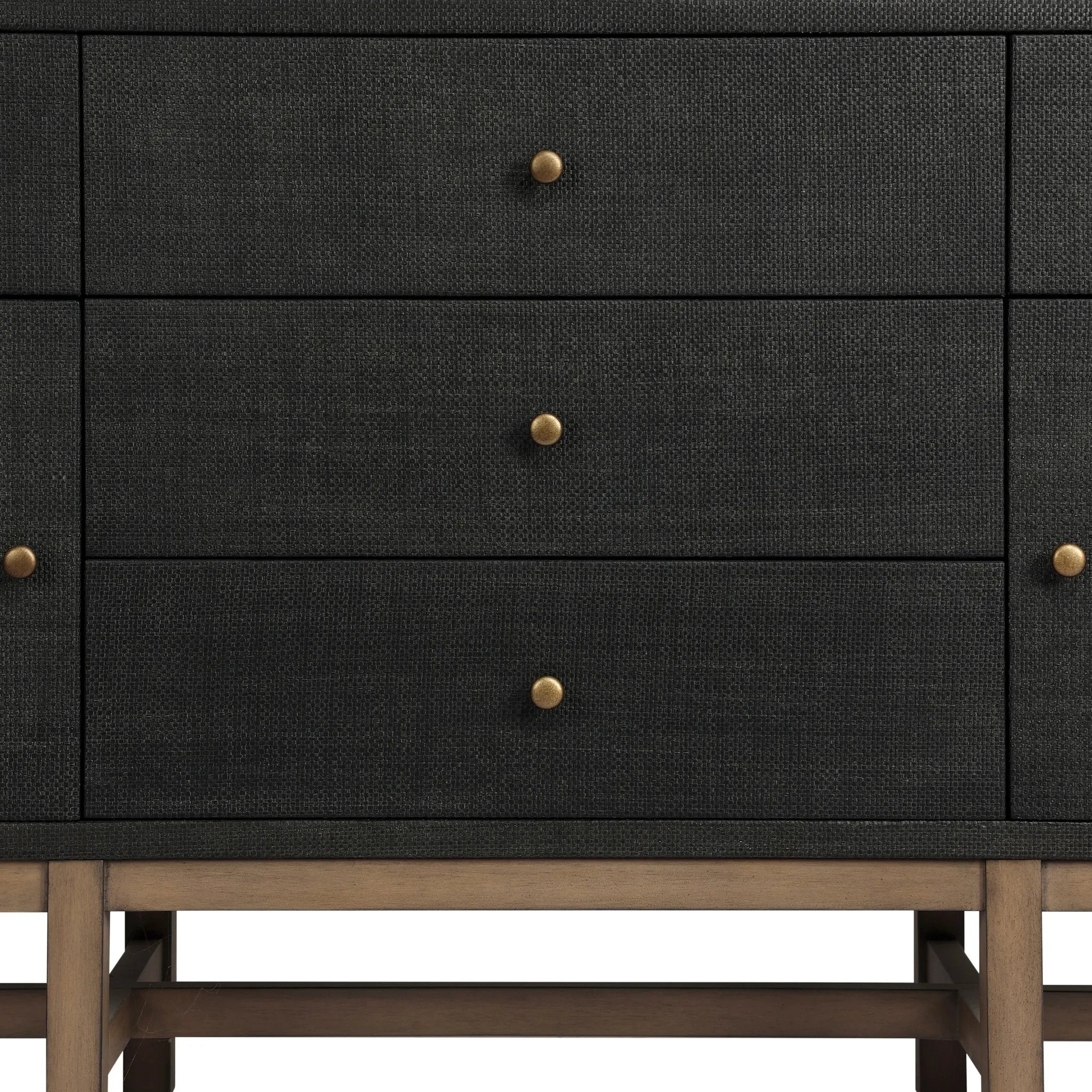 Featuring Fiona Russet Mahogany Sideboard by Four Hands at Amethyst Home. Woven black raffia places a texture-driven twist on sideboard storage. Five roomy drawers and two cabinets feature simple hardware finished in an antique brass, all supported by an open, airy base of solid mahogany.Overall Dimensions: 78.00"w x 18.00"d x 34.50"hWeight : 197.75 lbs. Amethyst Home provides interior design, new home construction design consulting, vintage area rugs, and lighting in the Newport Beach metro area.