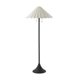Textures and deep hues unite for this floor lamp's beautiful glow. The scalloped shade features a creamy white canvas exterior covering an antiqued brass interior, and wrought iron pull chains adjust each lightbulb in Baroque-era form Amethyst Home provides interior design, new home construction design consulting, vintage area rugs, and lighting in the Miami metro area.