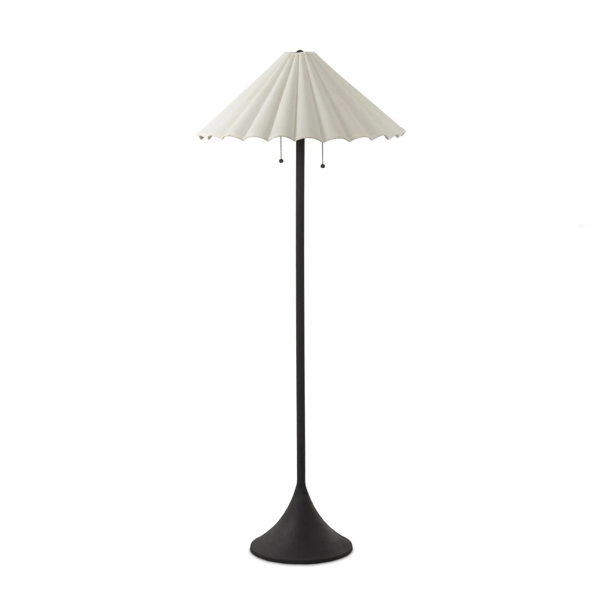 Textures and deep hues unite for this floor lamp's beautiful glow. The scalloped shade features a creamy white canvas exterior covering an antiqued brass interior, and wrought iron pull chains adjust each lightbulb in Baroque-era form Amethyst Home provides interior design, new home construction design consulting, vintage area rugs, and lighting in the Miami metro area.