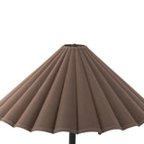 Textures and deep hues unite for this floor lamp's beautiful glow. The scalloped shade features a dark canvas exterior covering an antiqued brass interior, and wrought iron pull chains adjust each lightbulb in Baroque-era form Amethyst Home provides interior design, new home construction design consulting, vintage area rugs, and lighting in the Calabasas metro area.