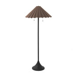 Textures and deep hues unite for this floor lamp's beautiful glow. The scalloped shade features a dark canvas exterior covering an antiqued brass interior, and wrought iron pull chains adjust each lightbulb in Baroque-era form Amethyst Home provides interior design, new home construction design consulting, vintage area rugs, and lighting in the Los Angeles metro area.