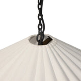 Textures and contrasting hues unite for this pendant's beautiful glow. The overscale scalloped shade features a creamy white canvas exterior covering a dark, antiqued brass interior, and a wrought iron chain for maximum drama Amethyst Home provides interior design, new home construction design consulting, vintage area rugs, and lighting in the Charlotte metro area.