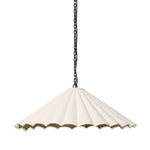 Textures and contrasting hues unite for this pendant's beautiful glow. The overscale scalloped shade features a creamy white canvas exterior covering a dark, antiqued brass interior, and a wrought iron chain for maximum drama Amethyst Home provides interior design, new home construction design consulting, vintage area rugs, and lighting in the Dallas metro area.